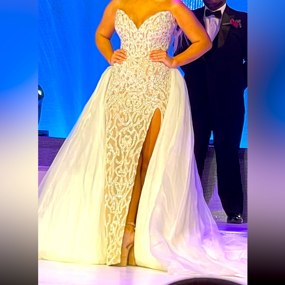 Jovani couture size 4, worn once , like new ! Retail price $6800.00